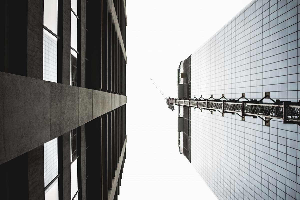 high rise black glass building urban